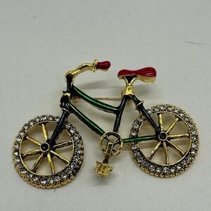 Elegant Gold and Red Bicycle Brooch